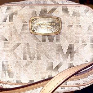 slightly worn micheal kors cross body bag